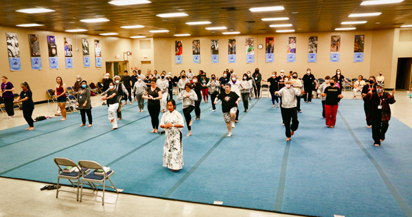 Attendees of the 2022 Rise Conference in a group class